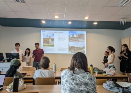 Figure 1: Photograph of students presenting on Topic 1