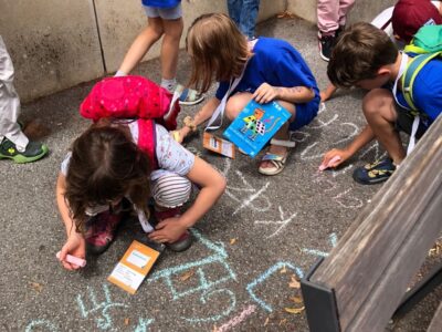 The children find a word related to an urban ecosystem for each letter of the alphabet.